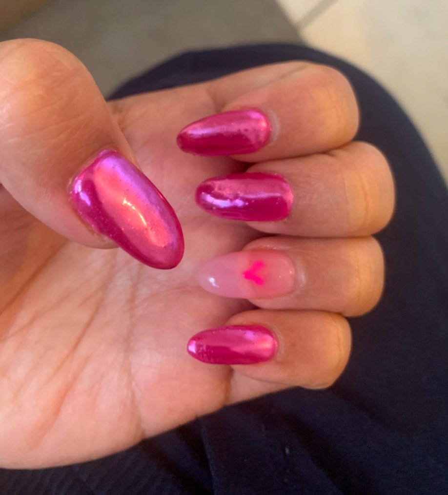 Close-up of freshly painted nails.